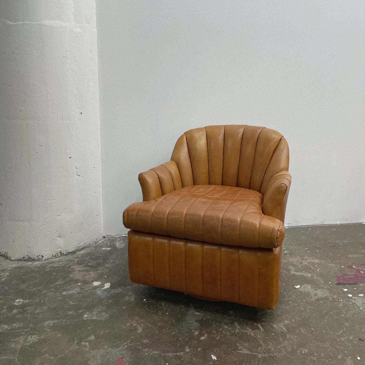 Channeled Leather Barrel Chairs