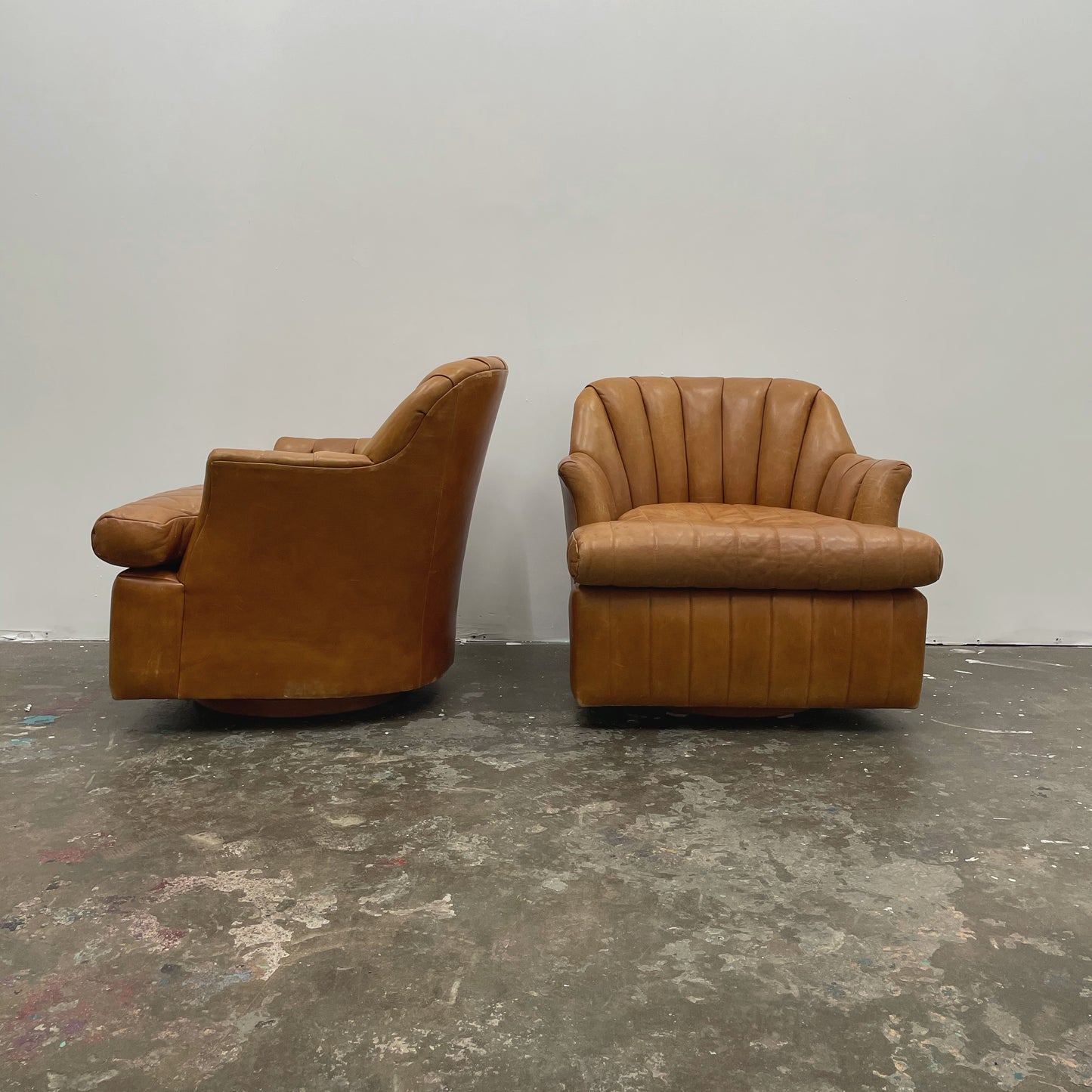 Channeled Leather Barrel Chairs