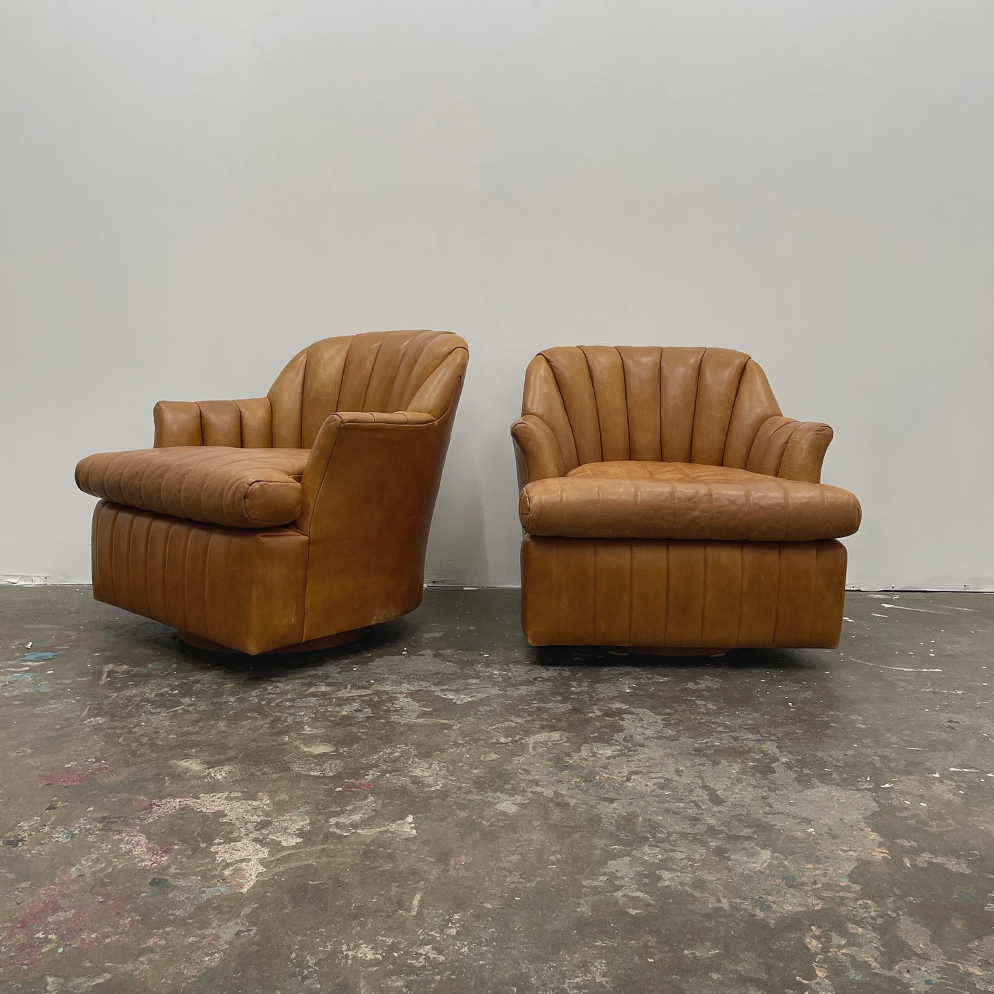 Channeled Leather Barrel Chairs