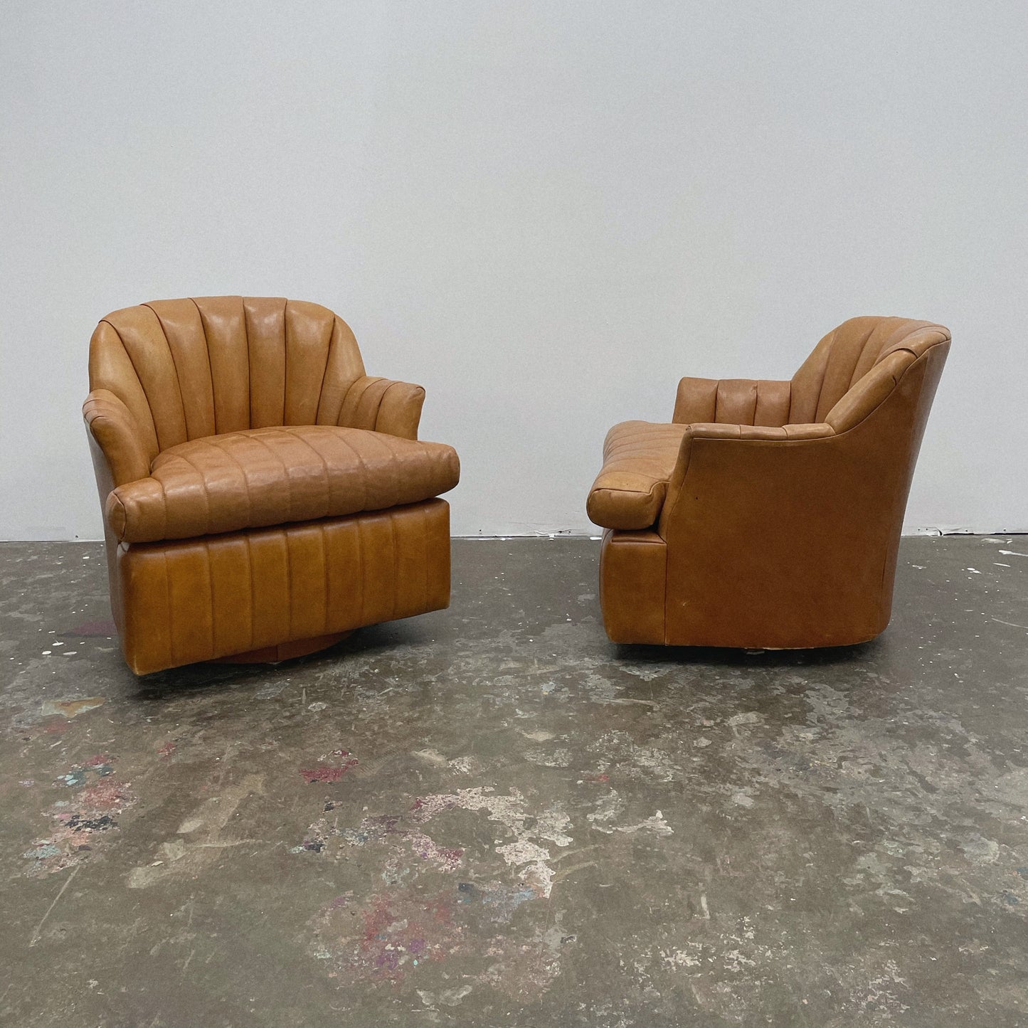 Channeled Leather Barrel Chairs