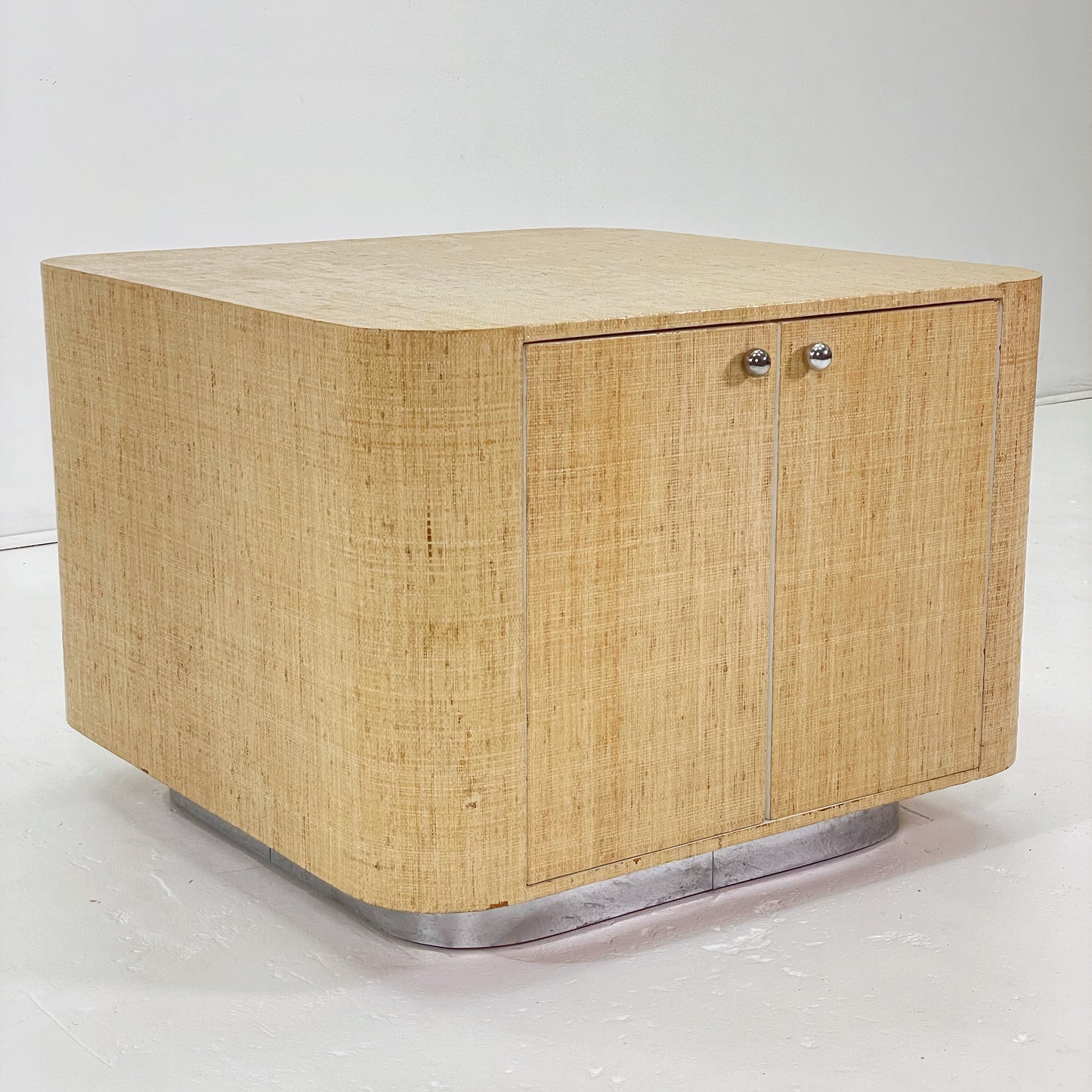 Grasscloth Cabinet on Chrome Plinth Base