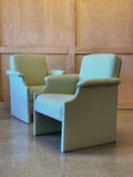 Pair of olive striped lounge chairs