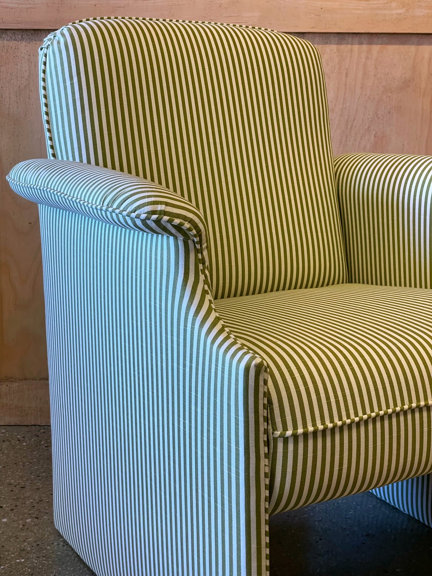 Pair of olive striped lounge chairs