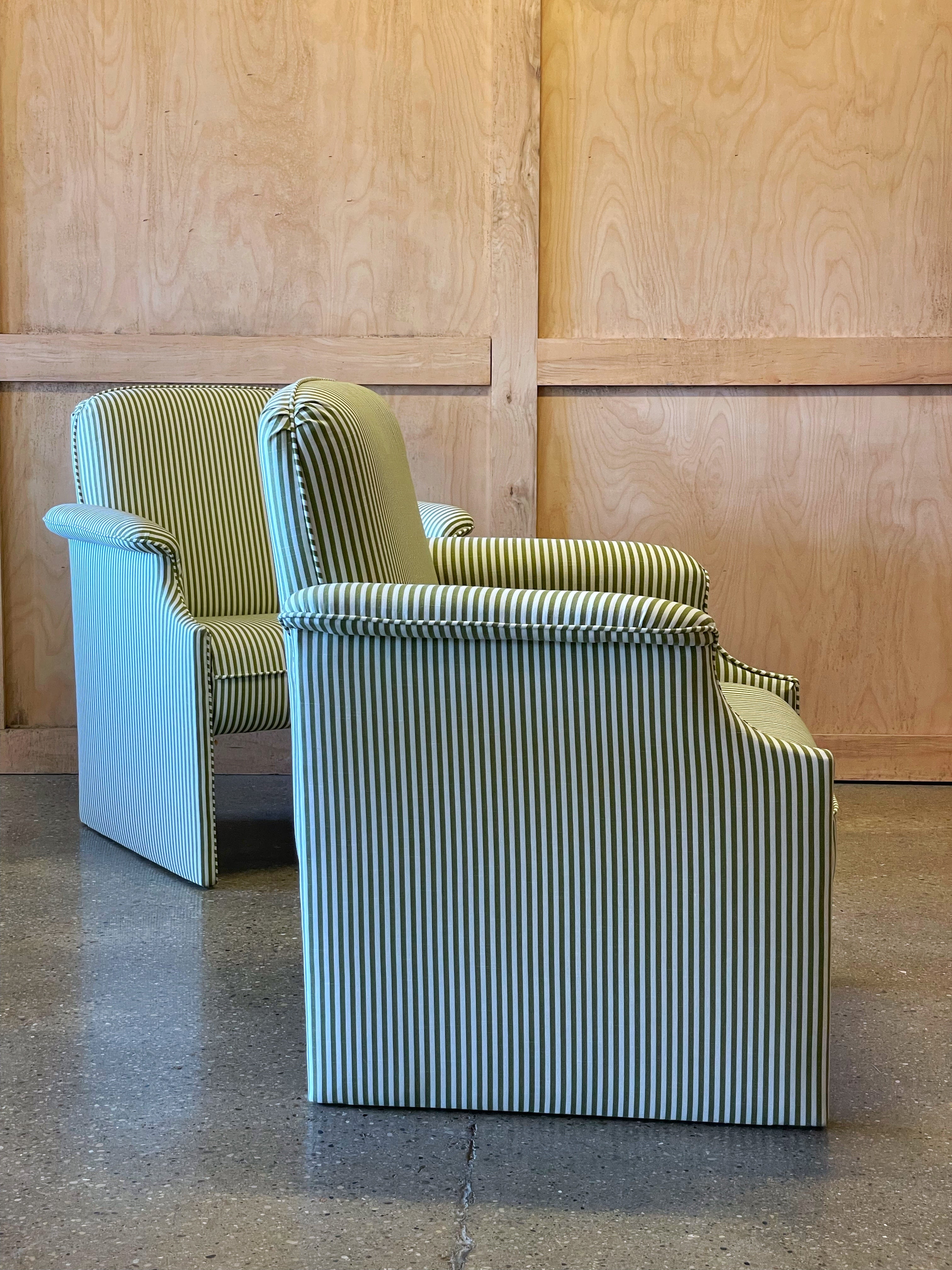 Pair of olive striped lounge chairs