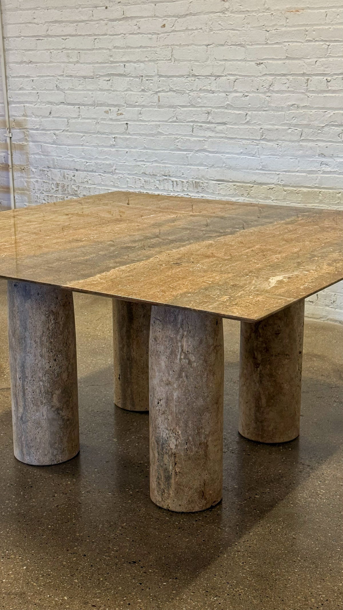 Brown travertine dining table