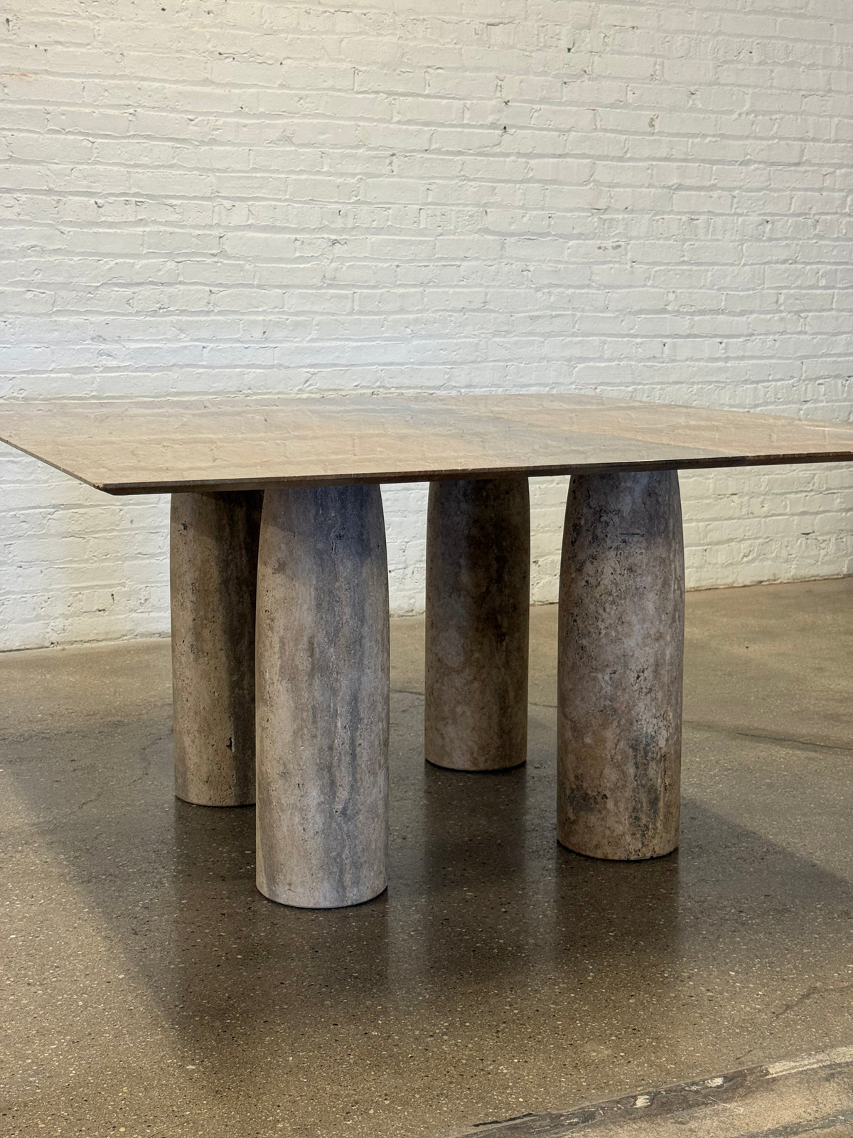 Brown travertine dining table
