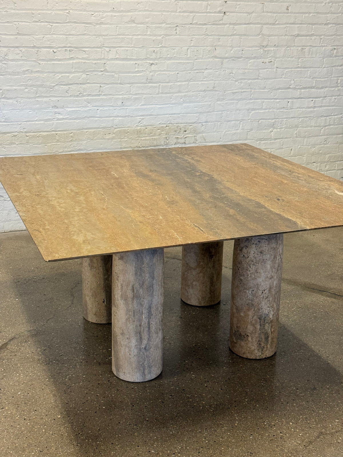 Brown travertine dining table