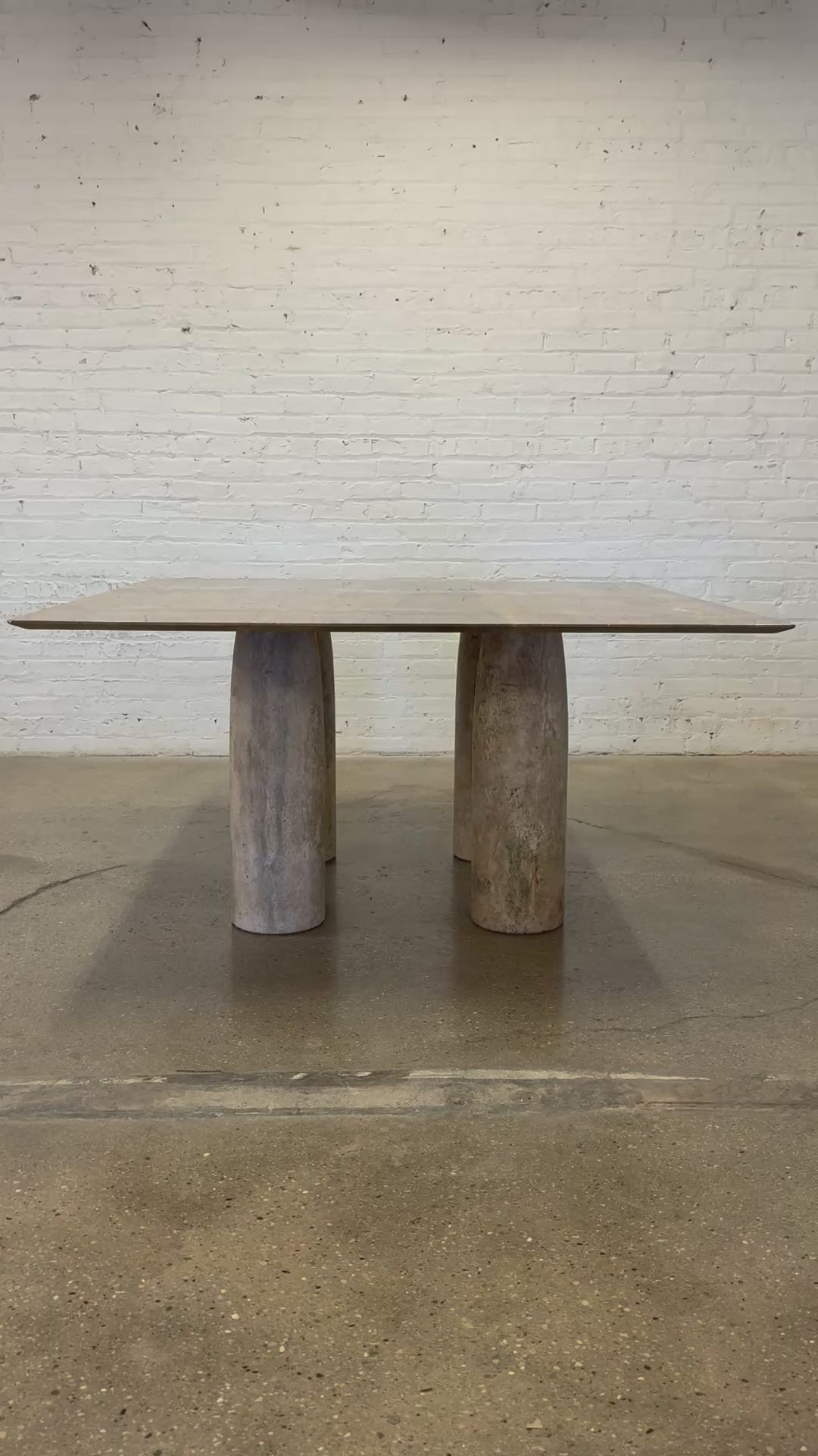 Brown travertine dining table