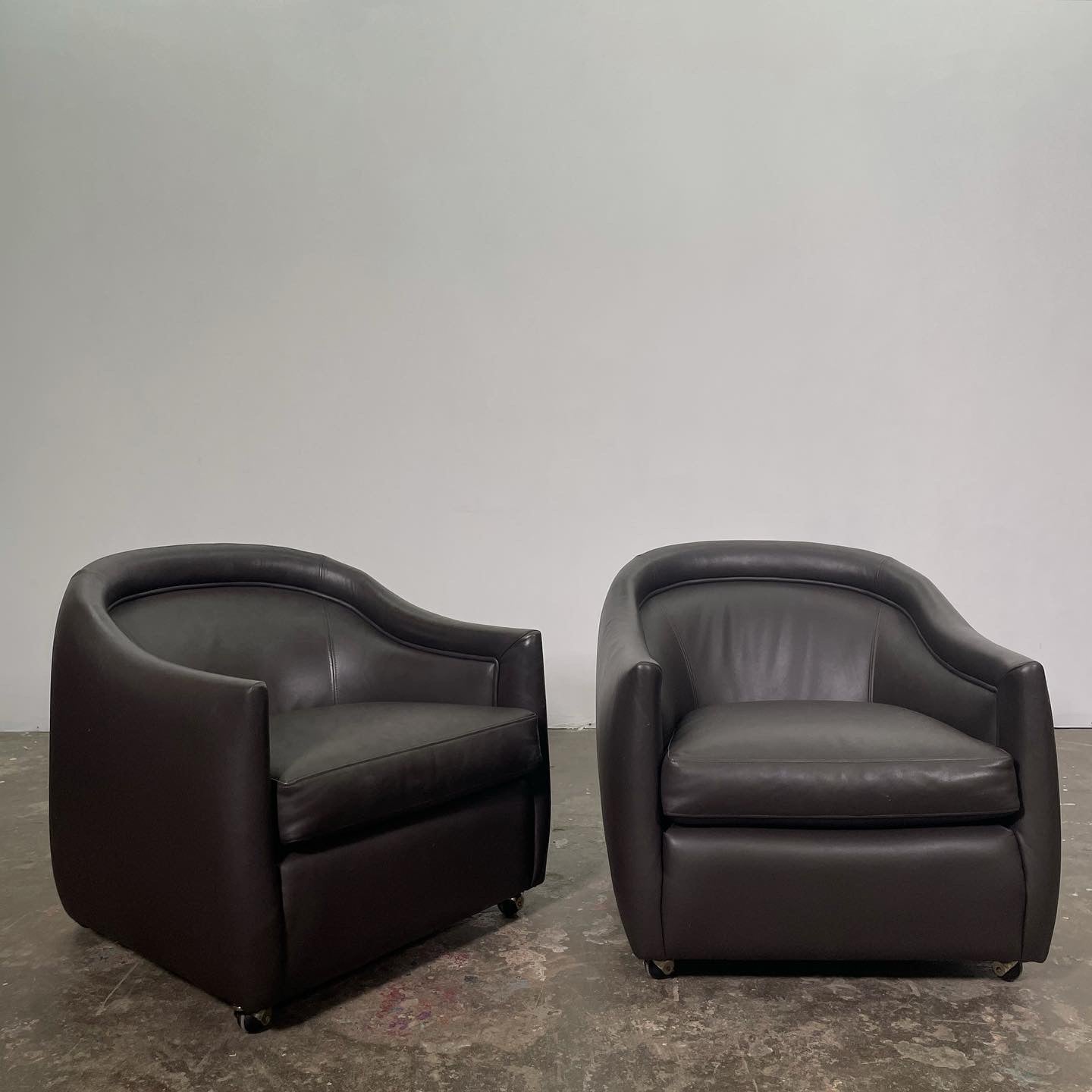 Pair of Italian Leather Club Chairs on Casters