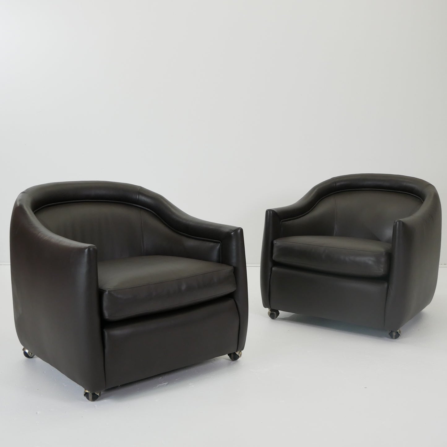 Pair of Italian Leather Club Chairs on Casters